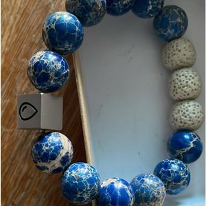 Marble blue bracelet with white volcanic rocks